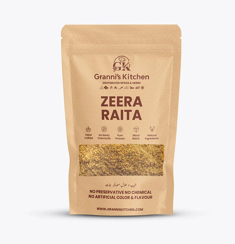 A package of Zeera Raita Powder by Grannis Kitchen with a small amount of raita powder spilled in front, against a white background.