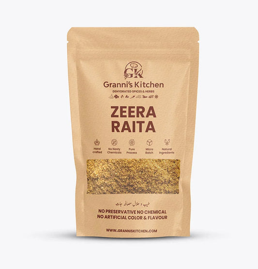 A package of Zeera Raita Powder by Grannis Kitchen with a small amount of raita powder spilled in front, against a white background.